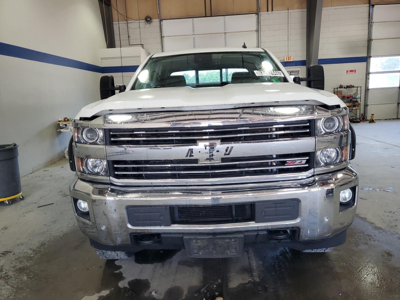 2015 Chevrolet Silverado K2500 Heavy Duty Ltz White vin: 1GC1KWE86FF195835 Damage: Front Metal Bumper Chrome, Chipped, 3