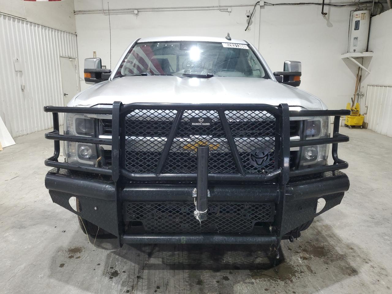 2015 Chevrolet Silverado K2500 Heavy Duty Ltz Silver vin: 1GC1KWE86FF525523 Damage: Grille, Aftermarket, Acceptable