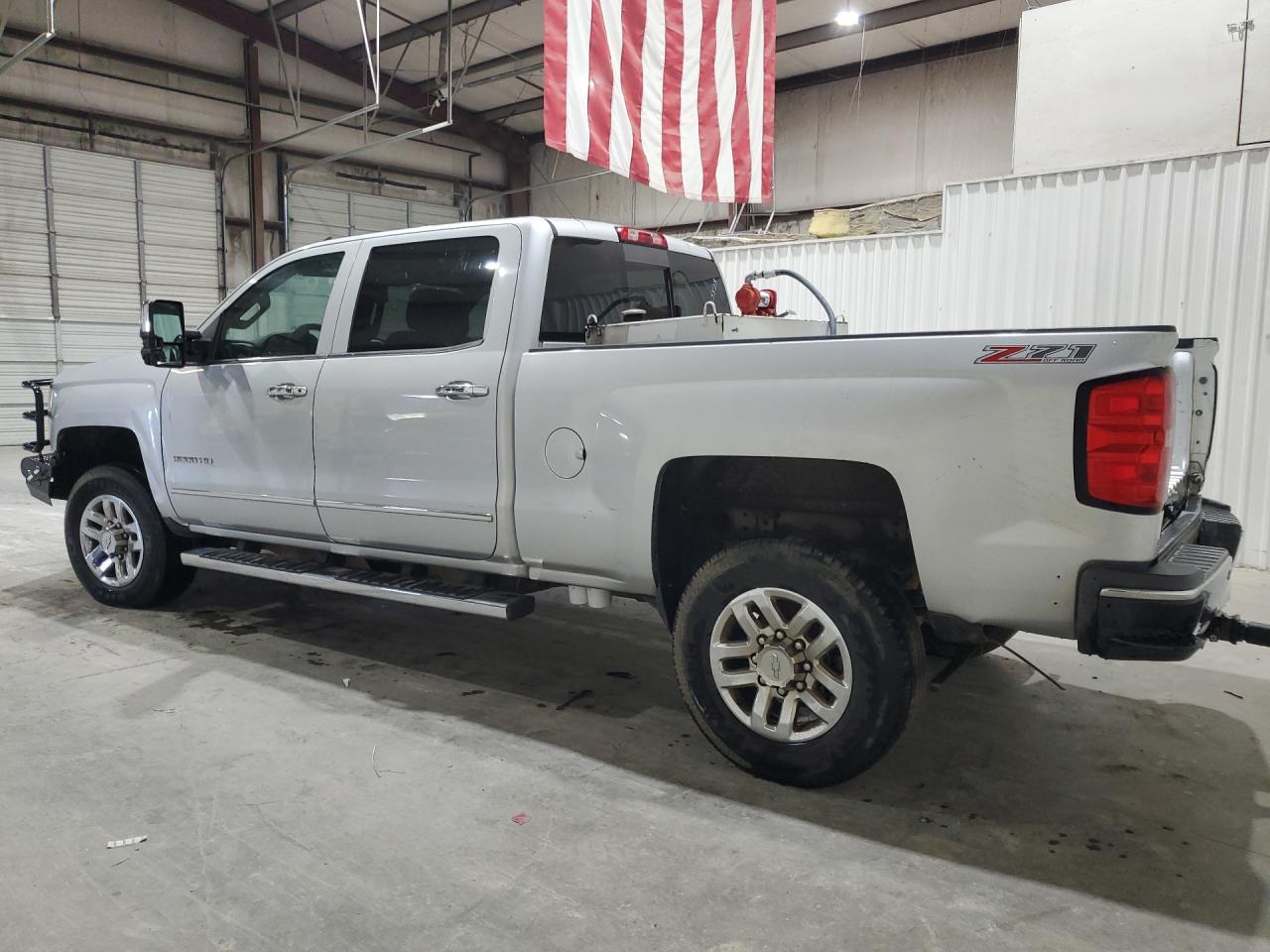 2015 Chevrolet Silverado K2500 Heavy Duty Ltz Silver vin: 1GC1KWE86FF525523 Damage: Left Front Door, Heavy Scratch, 2 To 3 Inches
