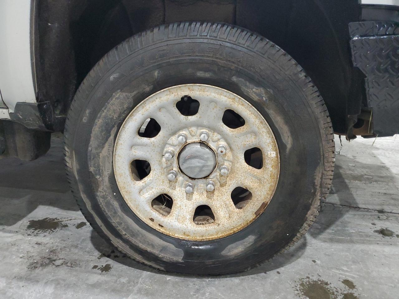 2015 Chevrolet Silverado K2500 Heavy Duty Ltz Silver vin: 1GC1KWE86FF525523 Damage: Right Front Wheel, Corrosion, > 12 Inches