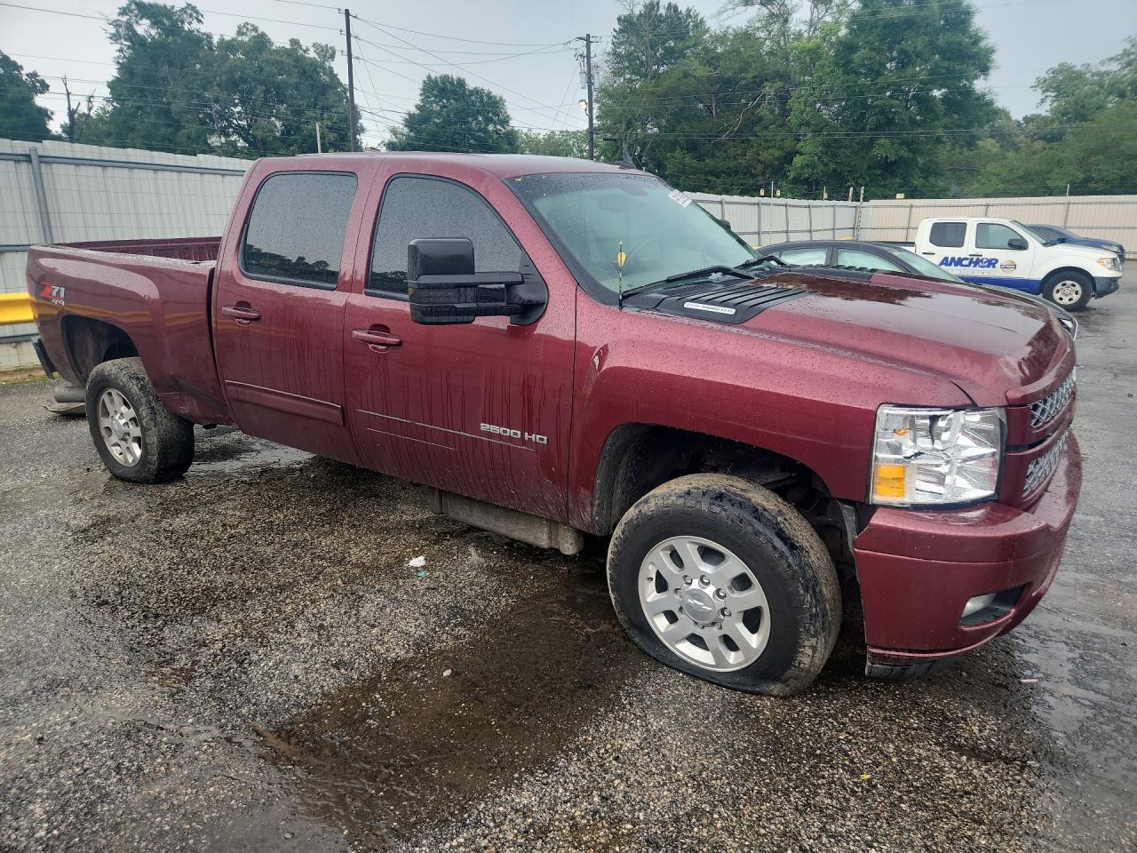 2013 Chevrolet Silverado K2500 Heavy Duty Ltz Maroon vin: 1GC1KYE80DF187092 Damage: Right Front Tire, Flat, Repair Required