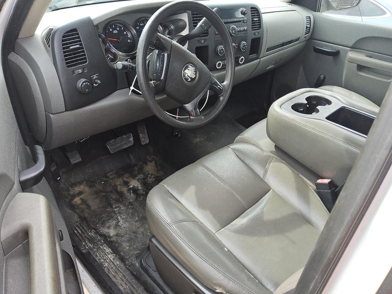 2011 Chevrolet Silverado C2500 Heavy Duty White vin: 1GC2CVC88BZ150273 Damage: Left Front Seat Cushion, Torn, 6 To 7 Inches