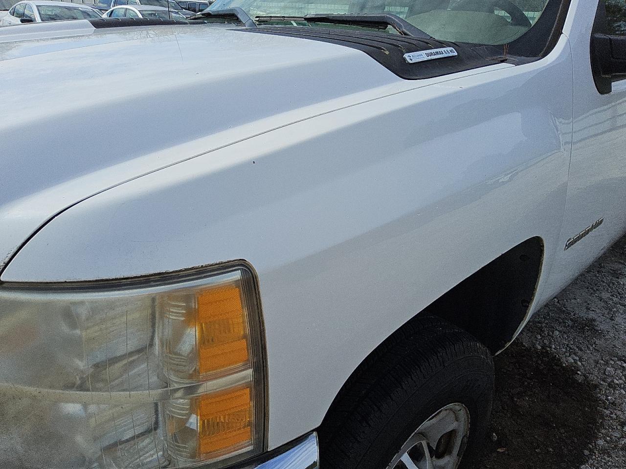 2011 Chevrolet Silverado C2500 Heavy Duty White vin: 1GC2CVC88BZ153920 Damage: Left Front Fender, Heavy Scratch, 1/2 To 1 Inch