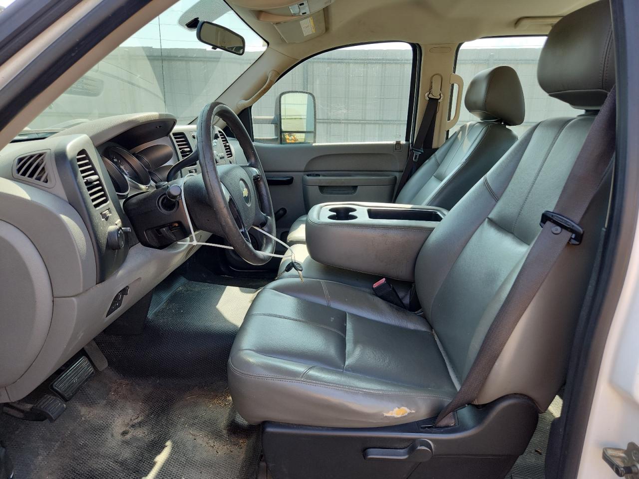 2010 Chevrolet Silverado C2500 Heavy Duty White vin: 1GC4CVBG4AF104036 Damage: Left Front Seat Cushion, Torn, 2 To 3 Inches