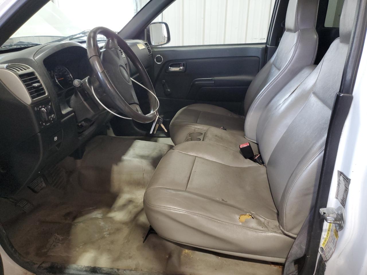 2012 Chevrolet Colorado White vin: 1GCCSBF93C8152532 Damage: Left Front Seat, Torn, 8 To 9 Inches
