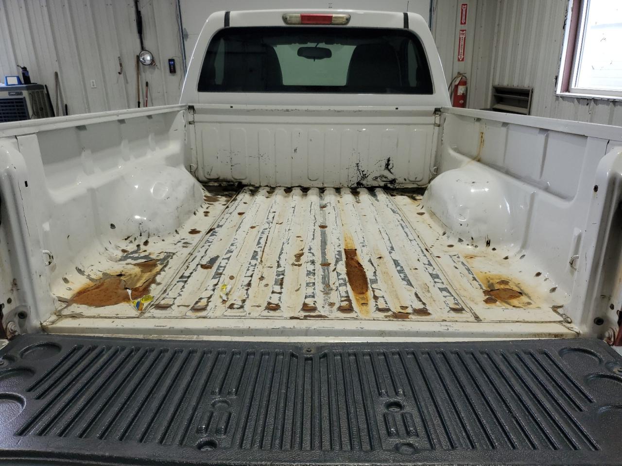 2012 Chevrolet Colorado White vin: 1GCCSBF93C8152532 Damage: Inside Bed, Rust, > 12 Inches