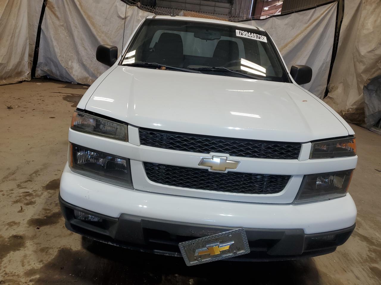 2012 Chev Colorado White vin: 1GCCSBF9XC8140121 Damage: Front Bumper Cover Upper, Multiple Scratches Heavy, 2