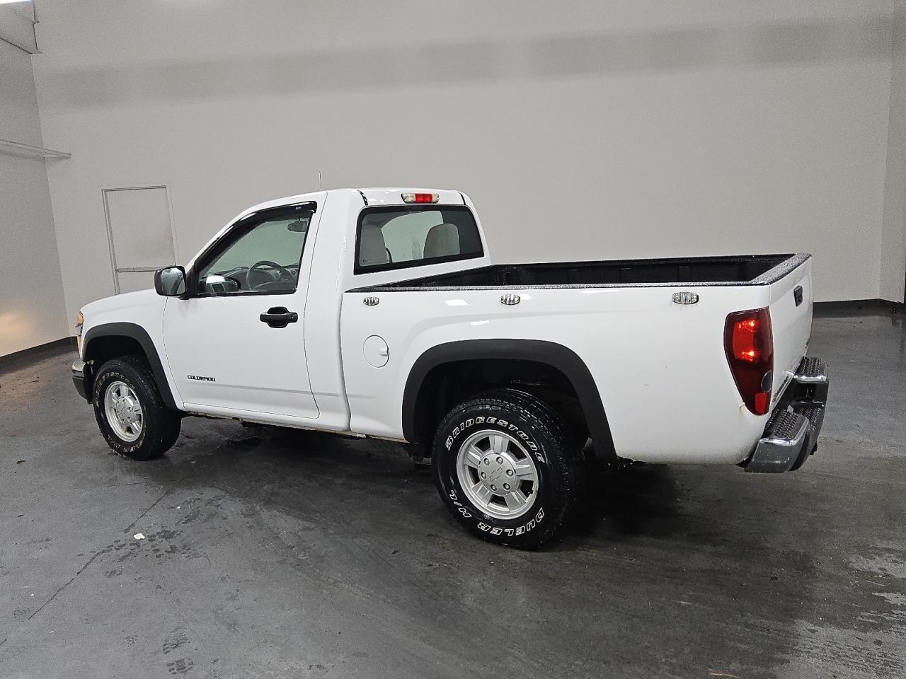 2005 Chevrolet Colorado White vin: 1GCDT146258209603 Damage: Left Bed Side, Dent(S) W/ Paint Dmg, 1 To 2 Inches