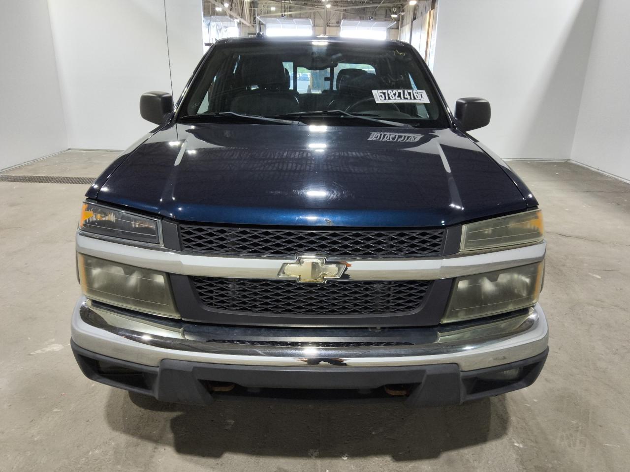 2008 Chevrolet Colorado Lt Blue vin: 1GCDT43E288205436 Damage: Front Emblem, Peeling, Replacement Required