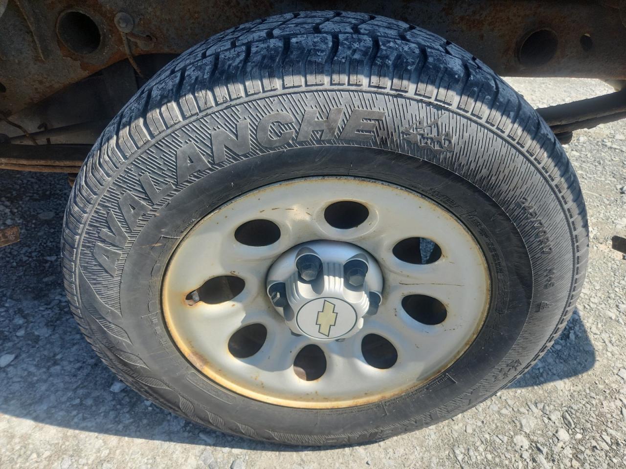 2009 Chevrolet Silverado C1500 Black vin: 1GCEC19C69Z244826 Damage: Left Rear Tire, Worn, Replacement Required