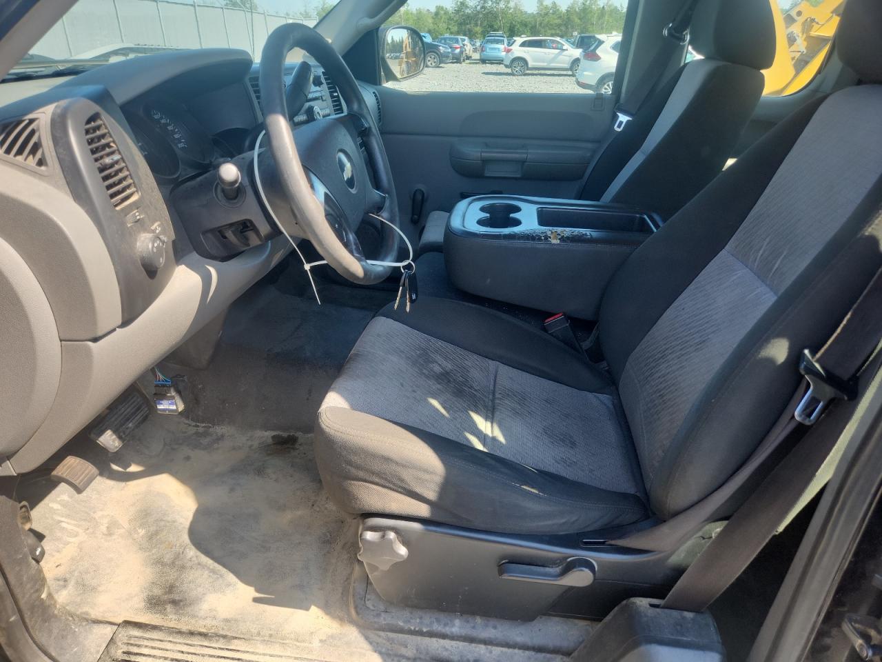 2009 Chevrolet Silverado C1500 Black vin: 1GCEC19C69Z244826 Damage: Left Front Seat Cushion, Stained, Permanent