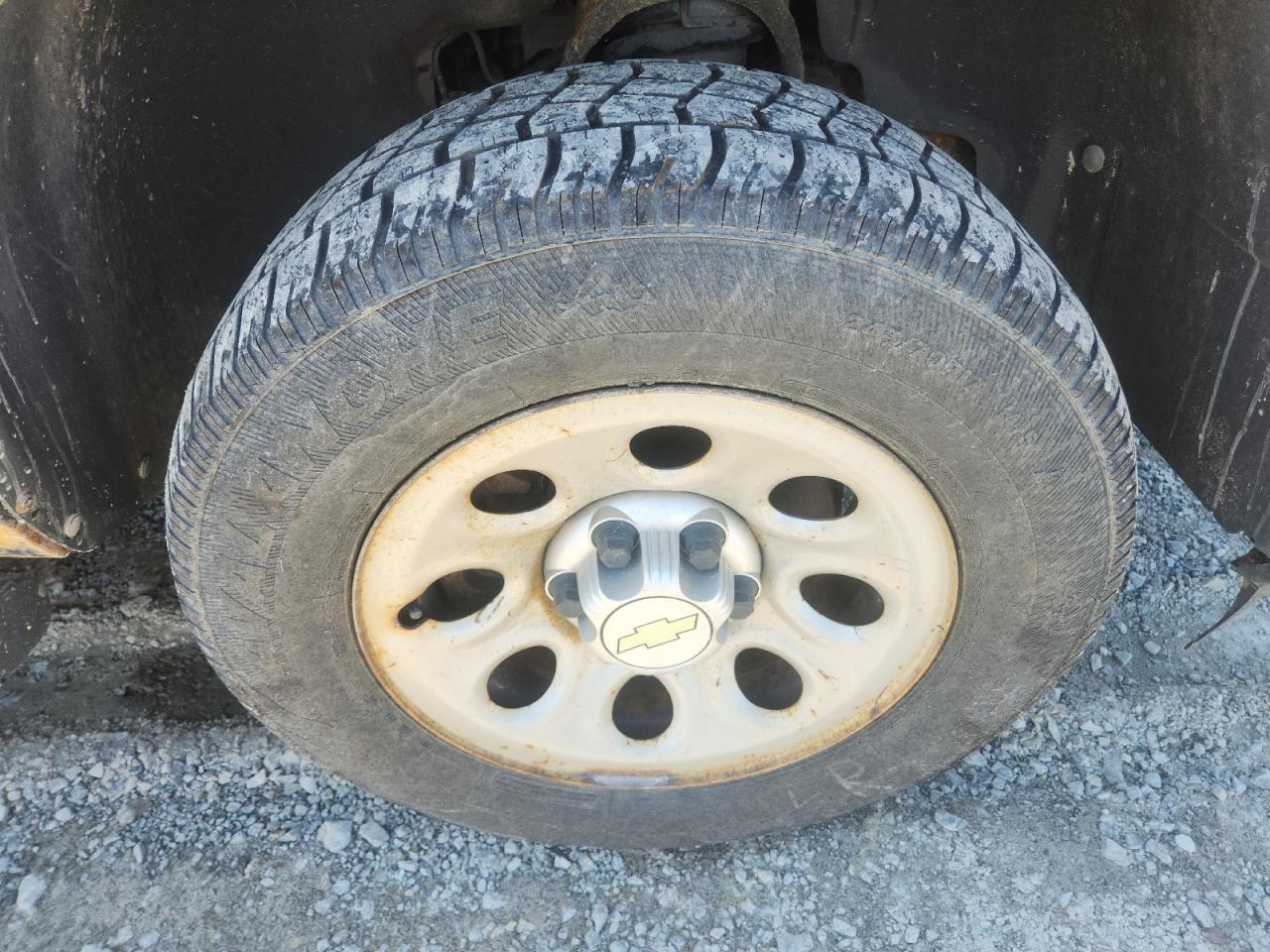 2009 Chevrolet Silverado C1500 Black vin: 1GCEC19C69Z244826 Damage: Right Front Wheel, Corrosion, > 12 Inches