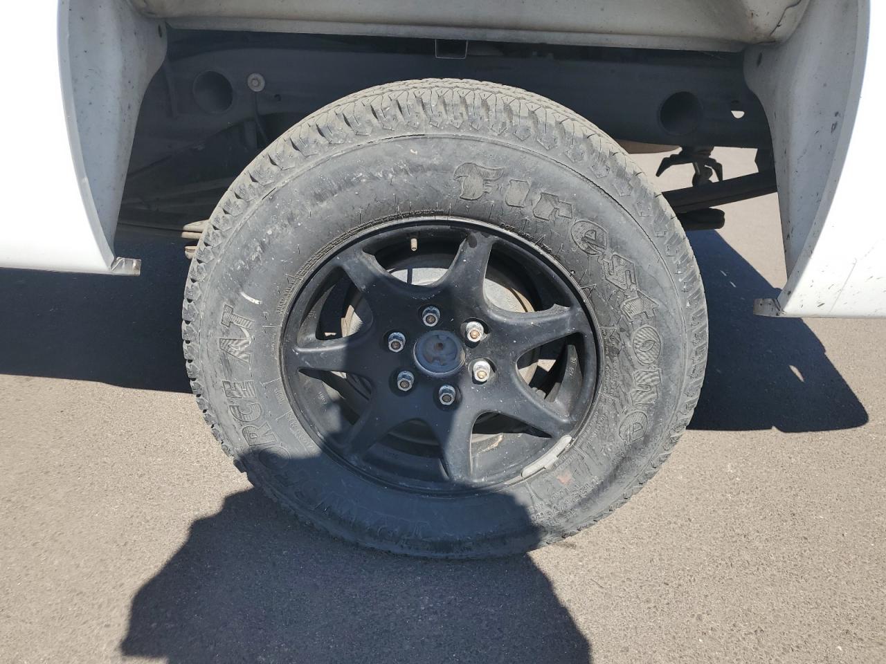2007 Chevrolet Silverado K1500 White vin: 1GCEK19077Z583584 Damage: Left Rear Wheel, Missing, Replacement Required