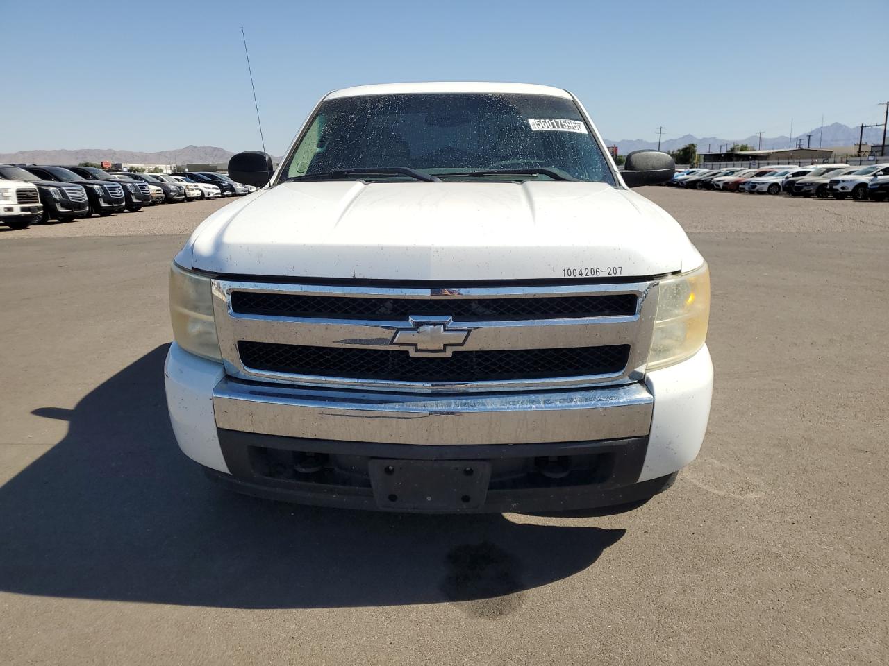2007 Chevrolet Silverado K1500 White vin: 1GCEK19077Z583584 Damage: Hood, Heavy Scratch, > 12 Inches