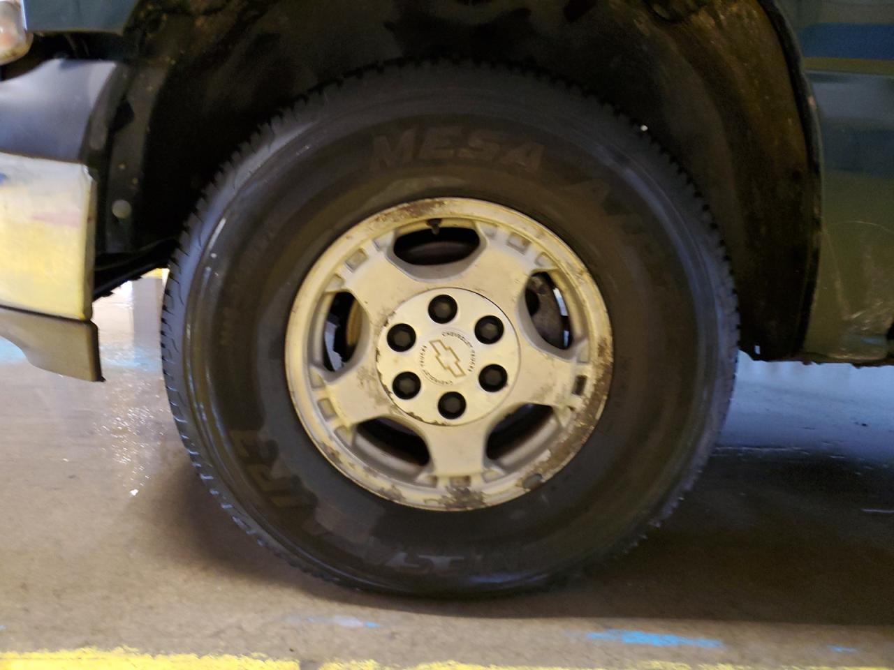 2001 Chevrolet Silverado K1500 Green vin: 1GCEK19T21E235166 Damage: Left Front Wheel, Corrosion, > 12 Inches