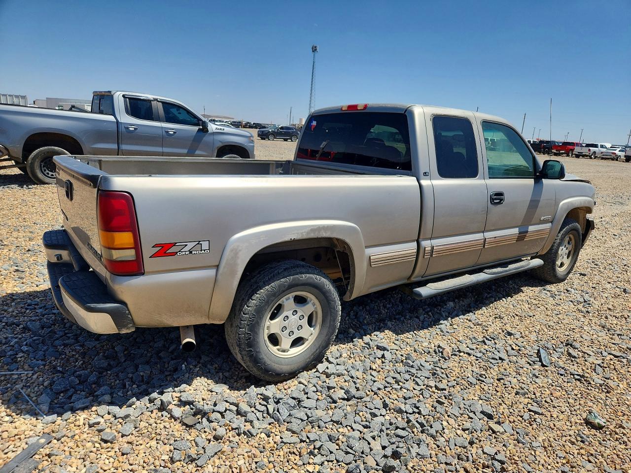 2001 Chevrolet Silverado K1500 Tan vin: 1GCEK19T61E165817