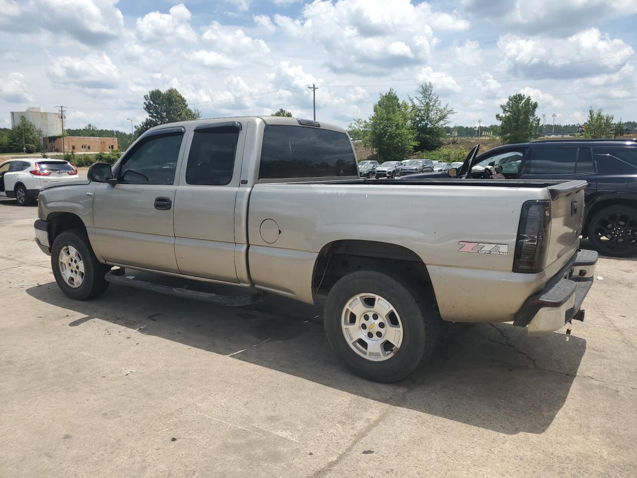 2003 Chevrolet Silverado K1500 Tan vin: 1GCEK19T63E234315 Damage: Left Bed Side, Dent(S) W/ Paint Dmg, 1 To 2 Inches