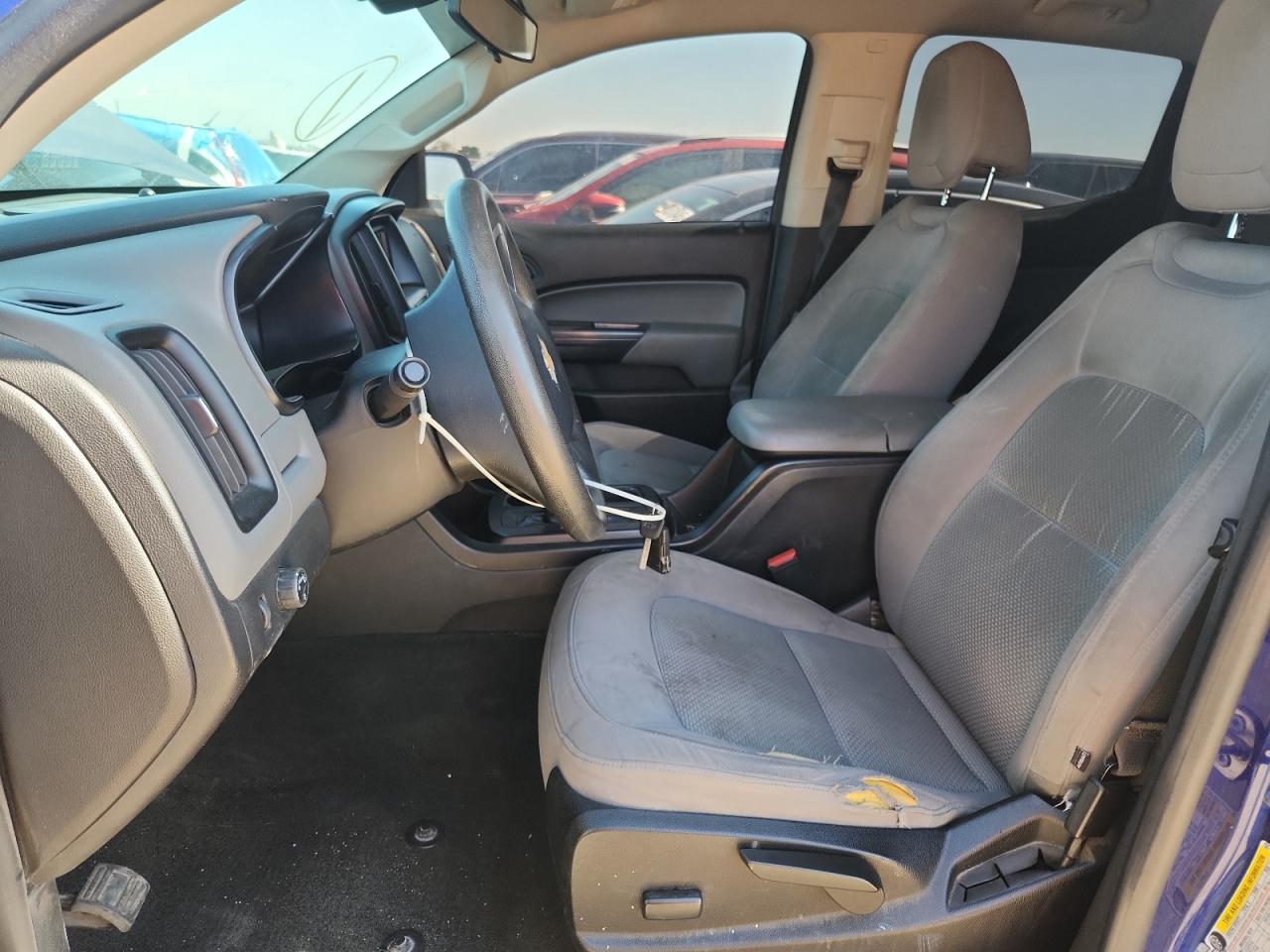 2015 Chevrolet Colorado Blue vin: 1GCGSAEA2F1261424 Damage: Left Front Seat Cushion, Torn, 5 To 6 Inches