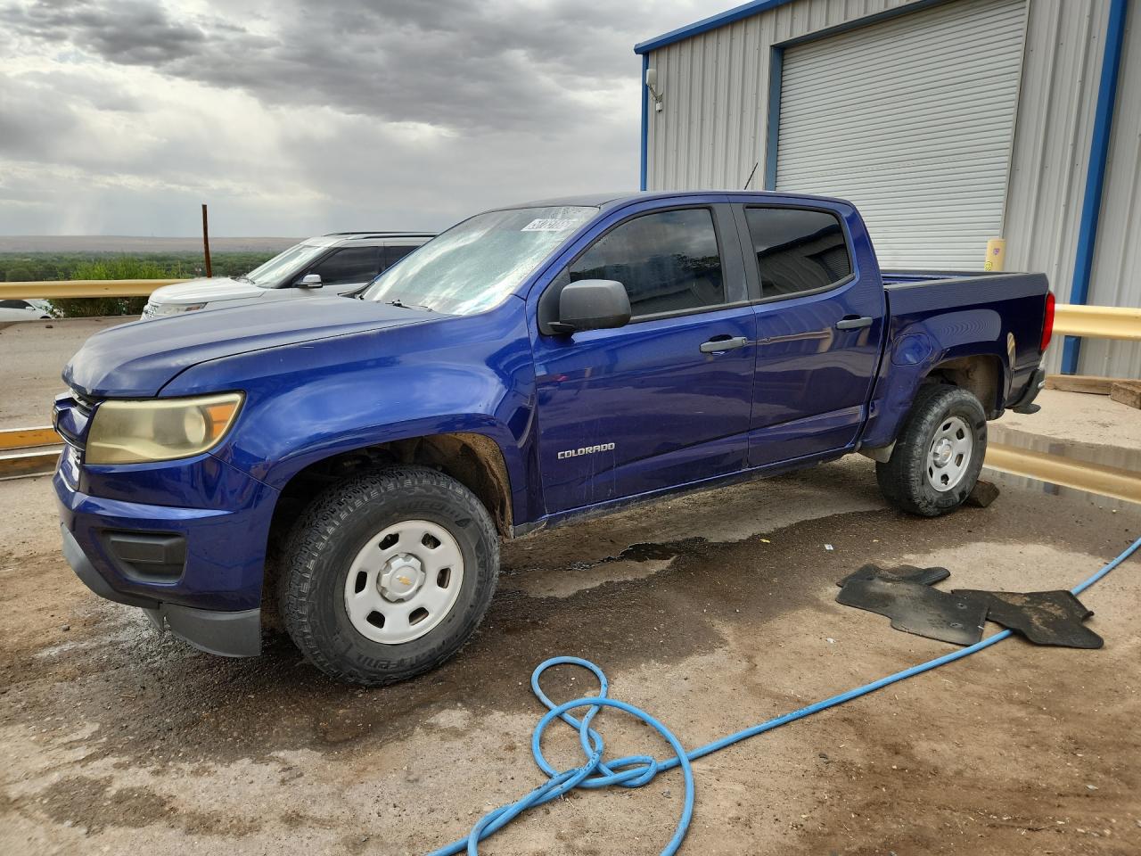 2015 Chevrolet Colorado Blue vin: 1GCGSAEA2F1261424 Damage: Left Front Fender, Heavy Scratch, 2 To 3 Inches