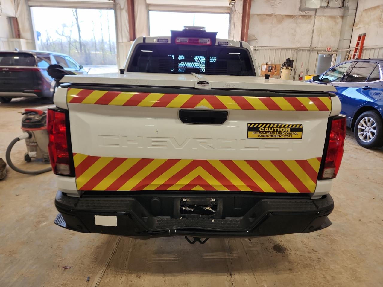 2023 Chevrolet Colorado White vin: 1GCGSBEC5P1265847 Damage: Rear Metal Bumper Painted, Severe Damage, Replacement Required