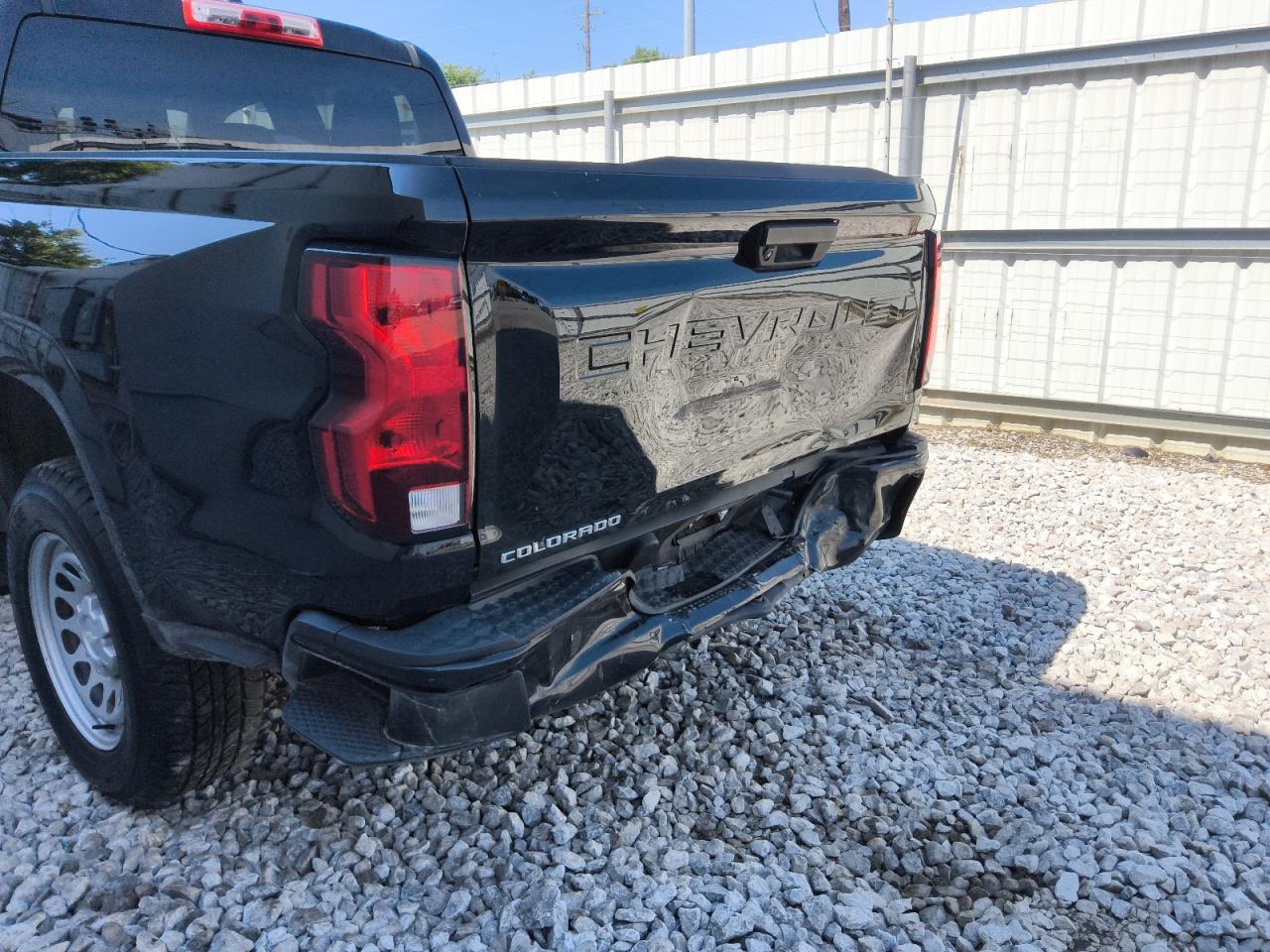2023 Chevrolet Colorado Black vin: 1GCGSBEC7P1180752 Damage: Left Bed Side, Dent(S) W/ Paint Dmg, 5 To 6 Inches