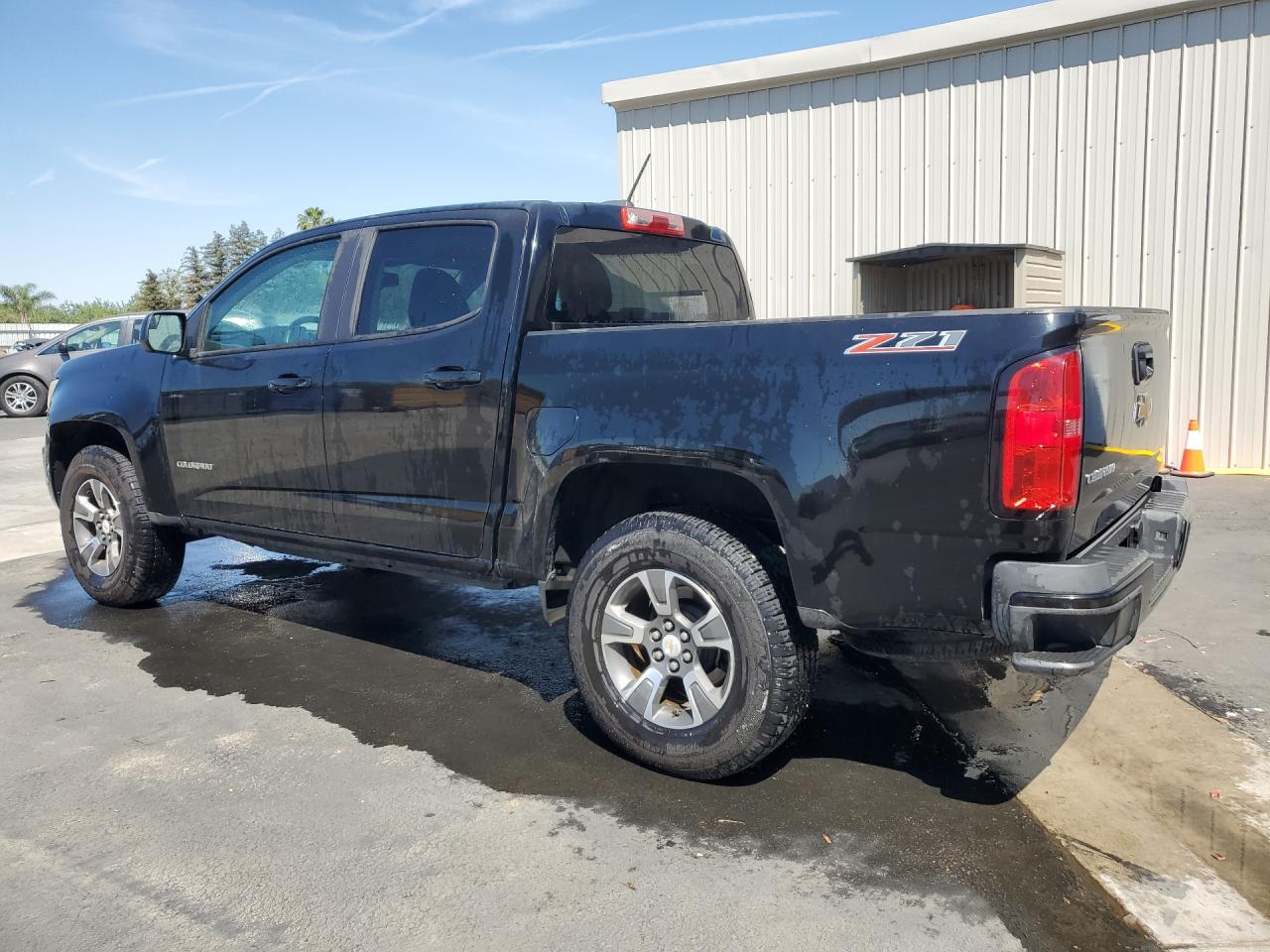 2015 Chevrolet Colorado Z71 Charcoal vin: 1GCGSCE38F1173023 Damage: Left Bed Side, Heavy Scratch, 1/2 To 1 Inch
