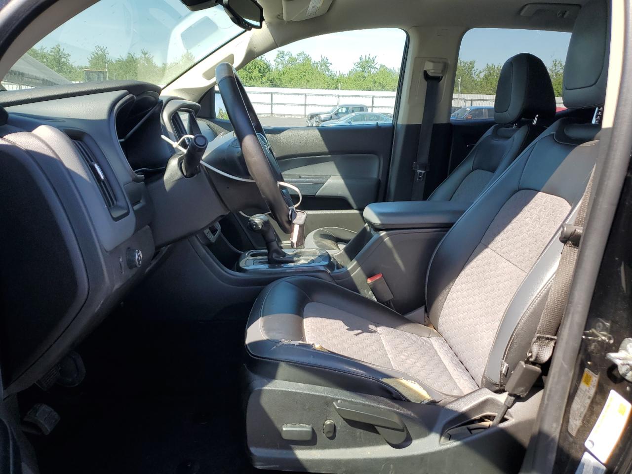 2015 Chevrolet Colorado Z71 Charcoal vin: 1GCGSCE38F1173023 Damage: Left Front Seat Cushion, Torn, > 12 Inches
