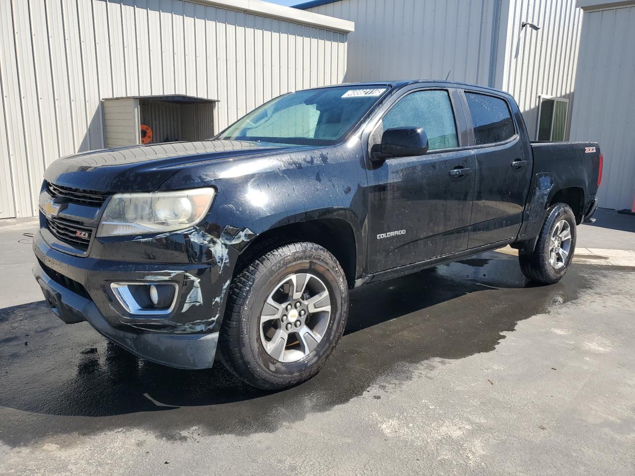 2015 Chevrolet Colorado Z71 Charcoal vin: 1GCGSCE38F1173023 Damage: Left Head Lamp, Faded, Repair Required
