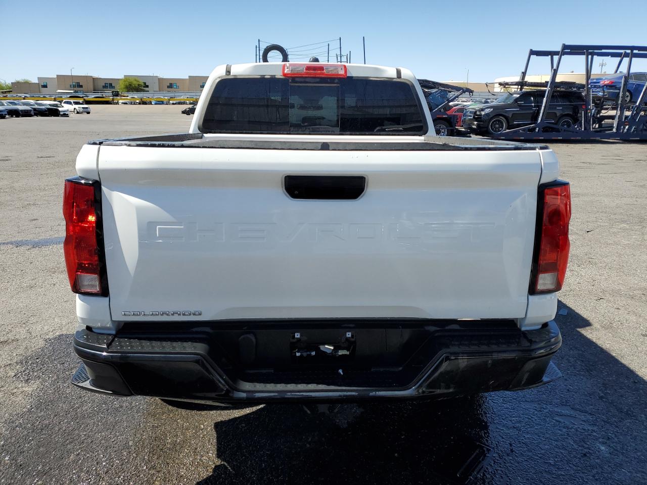 2024 Chevrolet Colorado White vin: 1GCGTBEC3R1113517 Damage: Rear Metal Bumper Painted, Dent(S) W/ Paint Dmg, 1 To 2 Inches