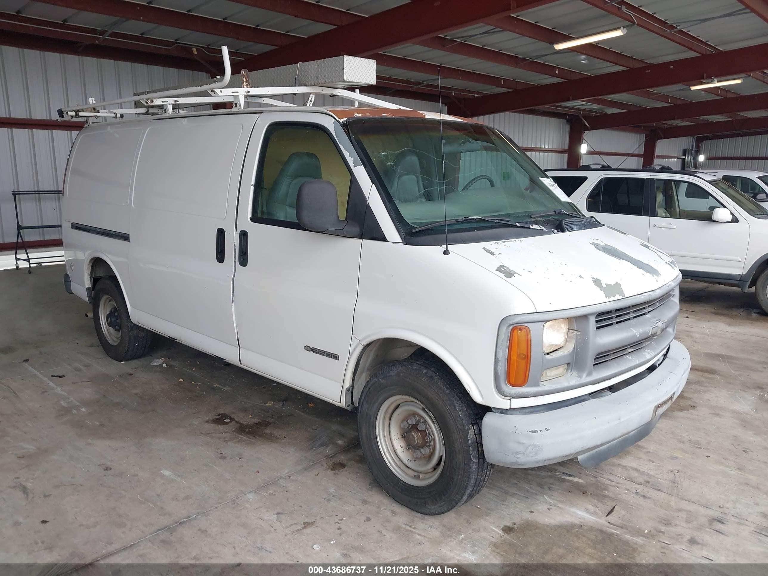 1999 Chevrolet Express   White vin: 1GCHG35R5X1005237