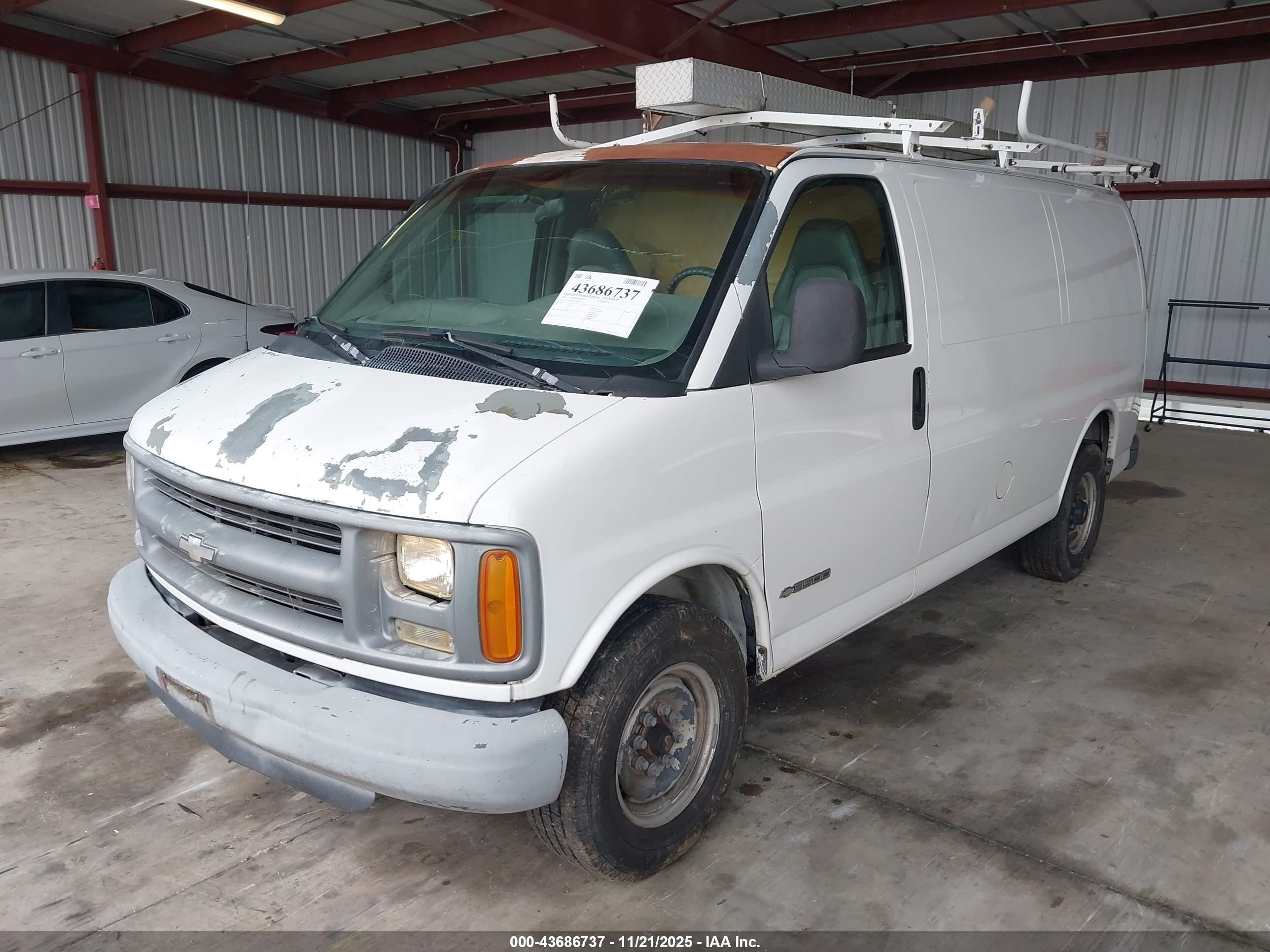 1999 Chevrolet Express   White vin: 1GCHG35R5X1005237