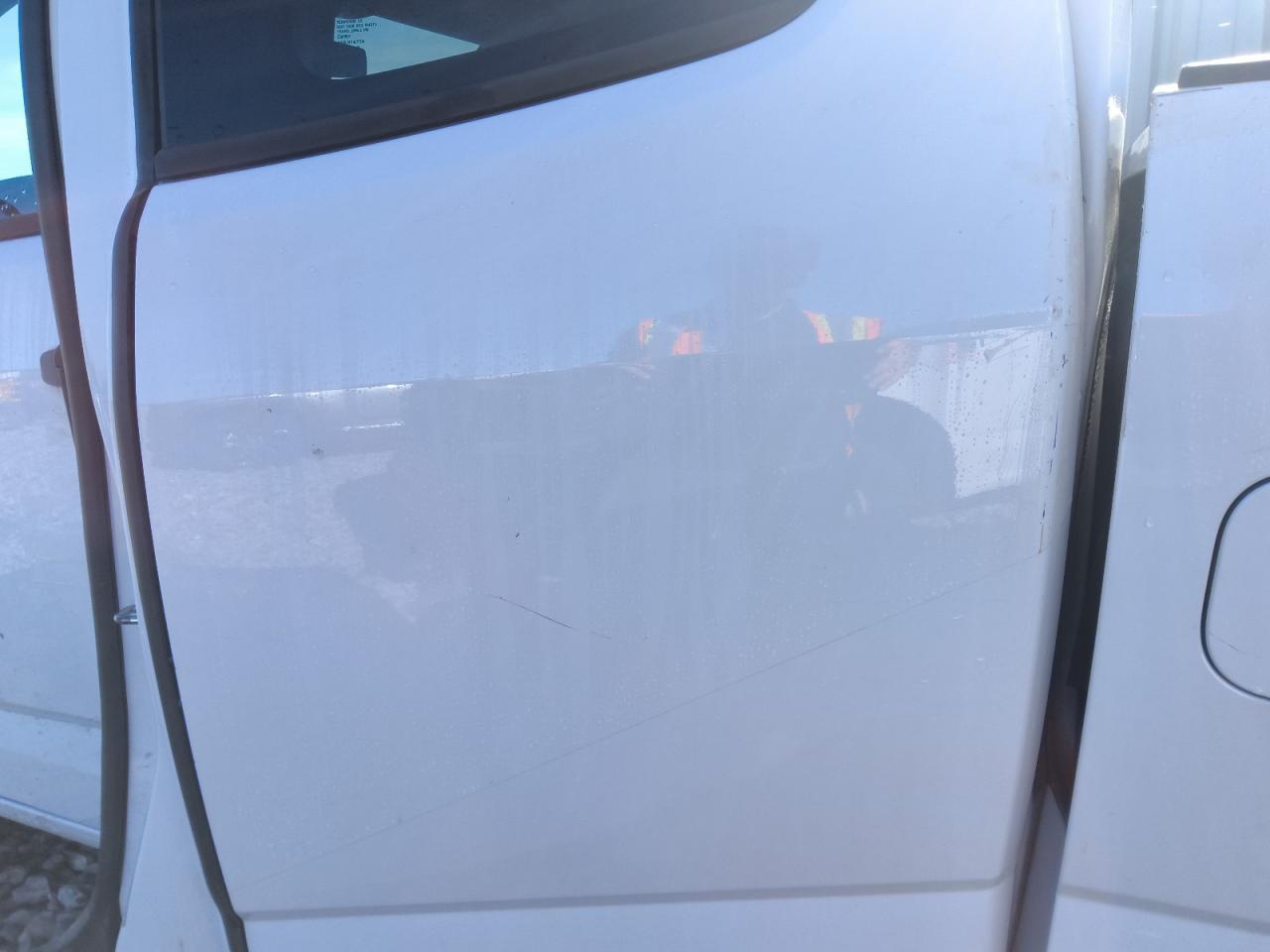 2019 Chevrolet Colorado White vin: 1GCHSBEA3K1332859 Damage: Left Rear Door, Heavy Scratch, 1/2 To 1 Inch