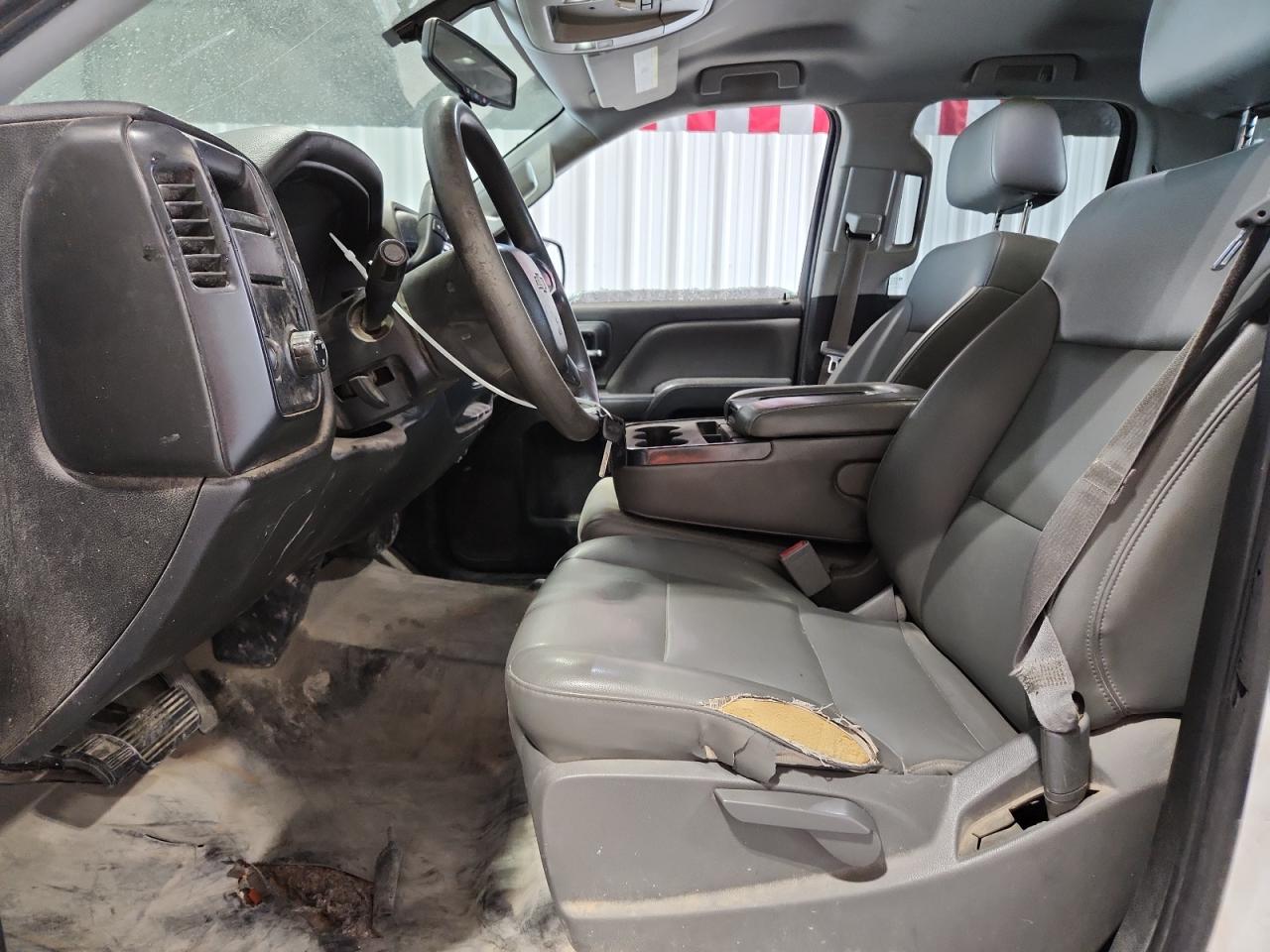 2015 Chevrolet Silverado C1500 White vin: 1GCRCPEC9FZ158495 Damage: Left Front Seat Cushion, Torn, 9 To 10 Inches