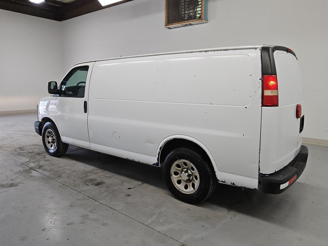 2014 Chevrolet Express G1500 White vin: 1GCSGAFX1E1165815 Damage: Overall Vehicle, Repainted, Non-Oem