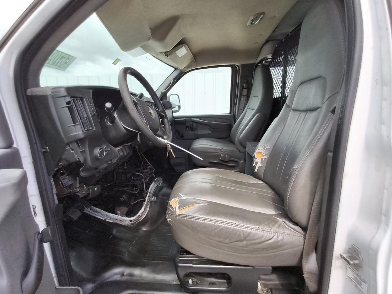 2012 Chevrolet Express G1500 Ls White vin: 1GCSGAFX5C1139635 Damage: Left Front Seat, Torn, > 12 Inches