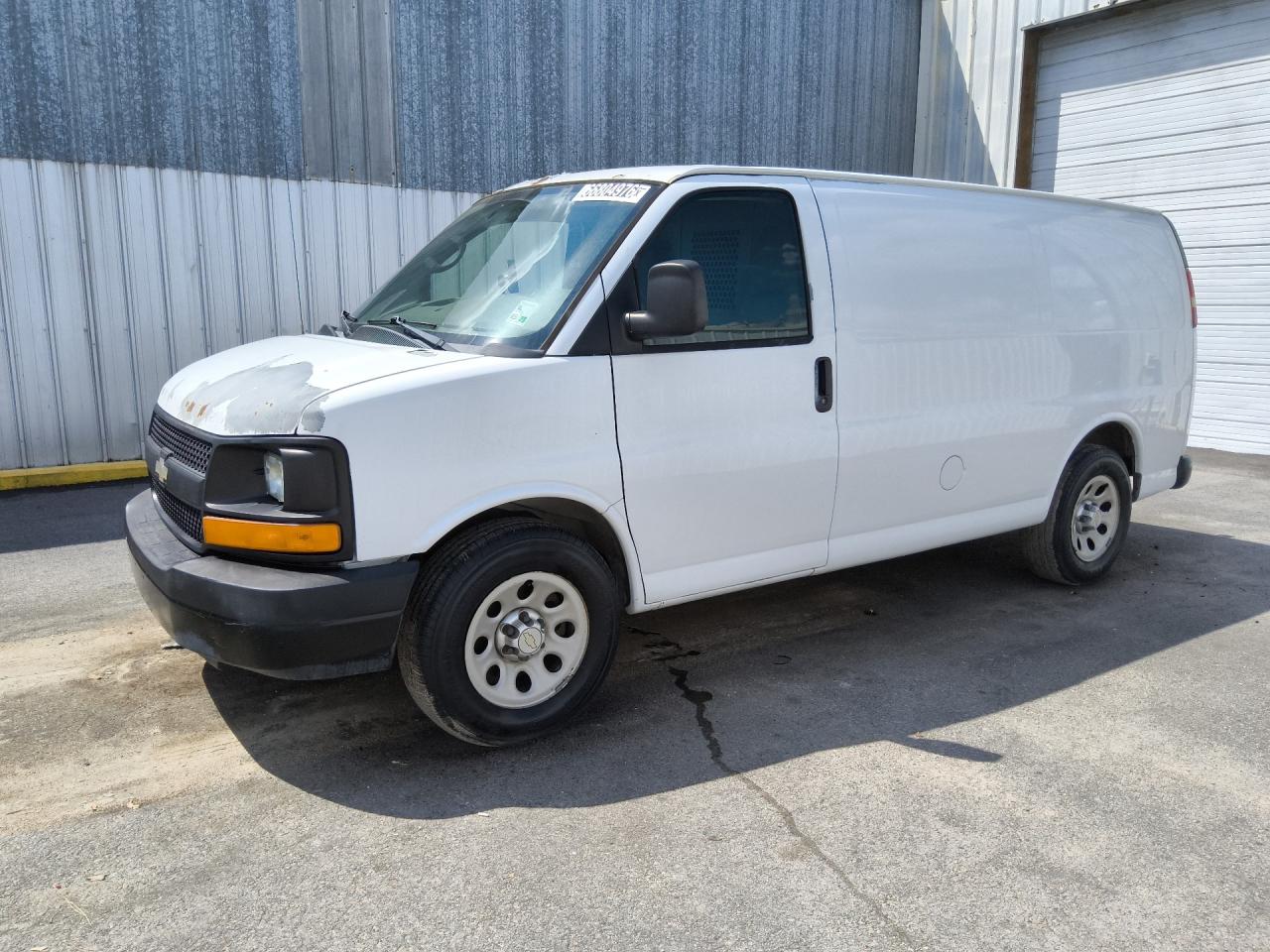 2012 Chevrolet Express G1500 White vin: 1GCSGAFX7C1157067 Damage: Left Front Fender, Peeling, 3 To 4 Inches