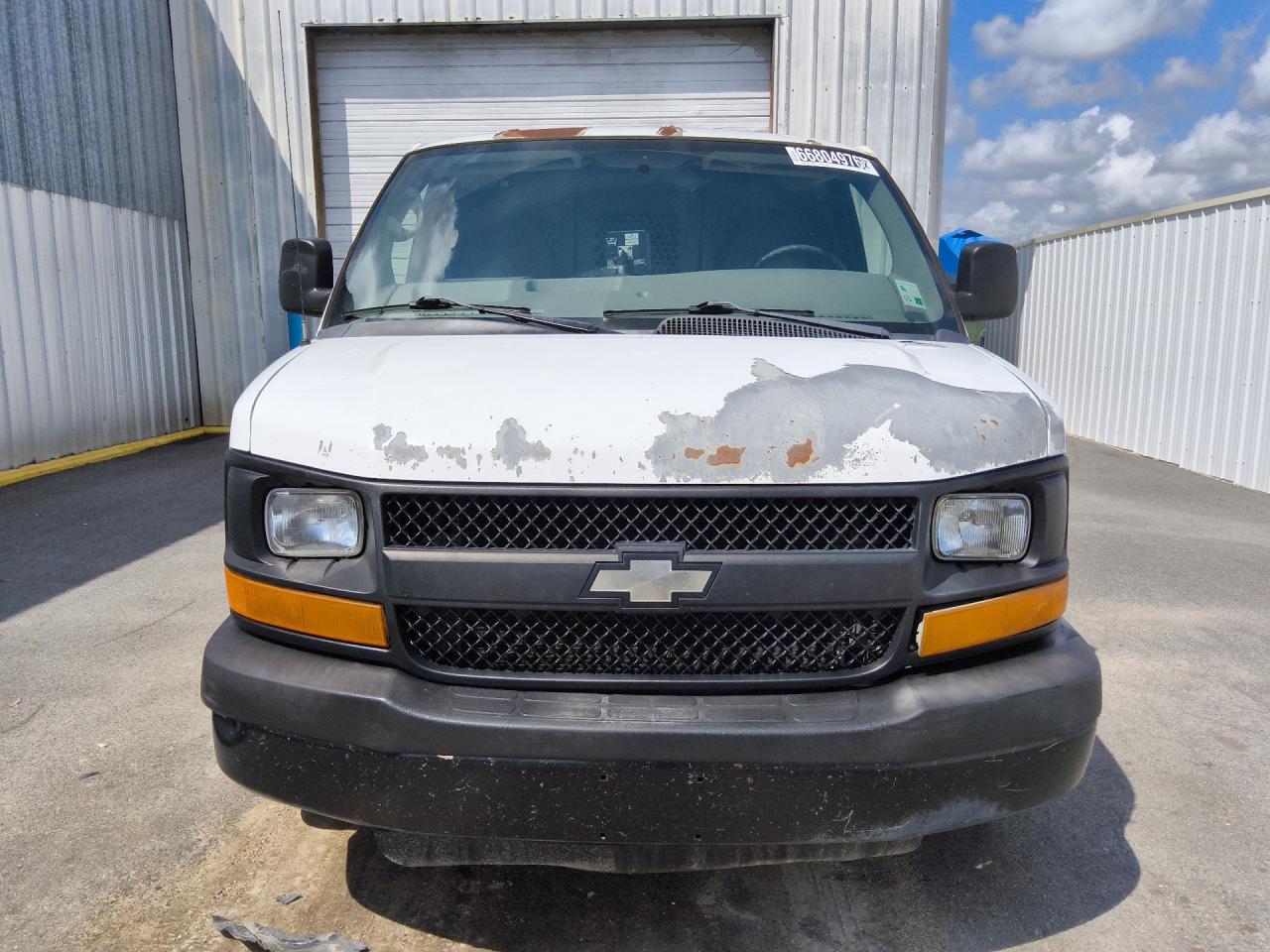2012 Chevrolet Express G1500 White vin: 1GCSGAFX7C1157067 Damage: Front Metal Bumper Painted, Oxidized, 7 To 8 Inches