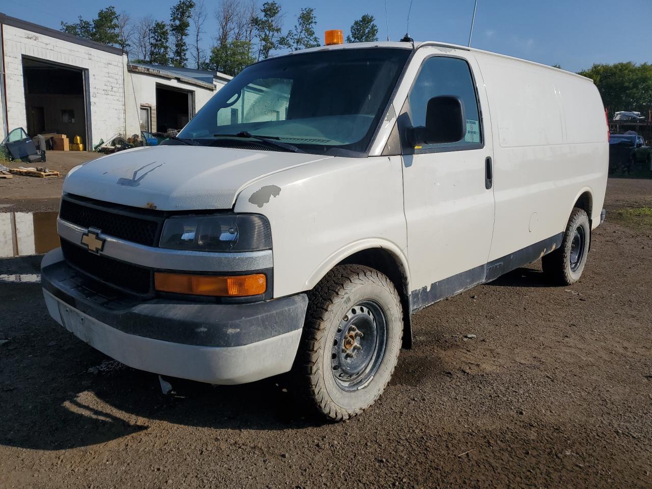 2012 Chevrolet Express G1500 White vin: 1GCSHAF48C1122444 Damage: Left Front Fender, Peeling, > 12 Inches