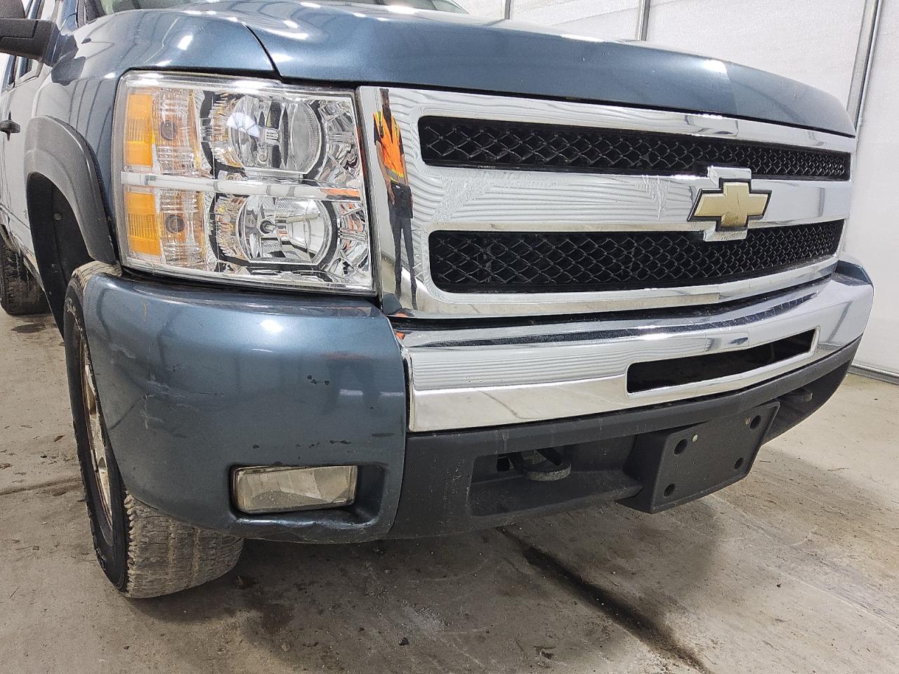 2010 Chevrolet Silverado K1500 Lt Blue vin: 1GCSKSE30AZ152357 Damage: Front Metal Bumper Painted, Dent(S) W/ Paint Dmg, > 12 Inches
