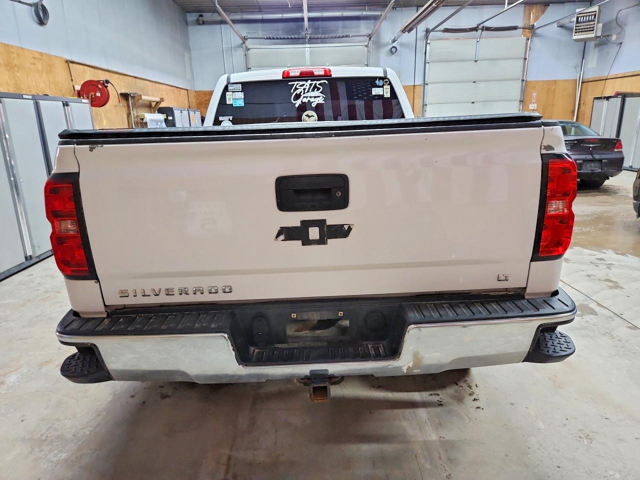 2015 Chevrolet Silverado K1500 Lt Белый vin: 1GCVKREC0FZ255033