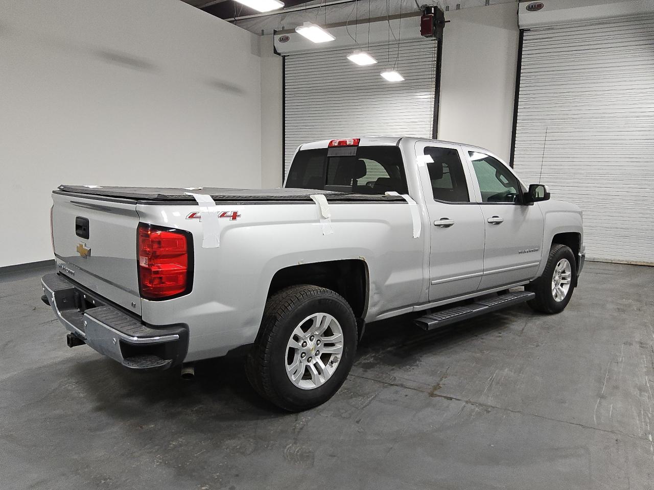 2015 Chevrolet Silverado K1500 Lt Silver vin: 1GCVKREC2FZ175118 Damage: Aftermarket Accessory, Aftermarket, Acceptable