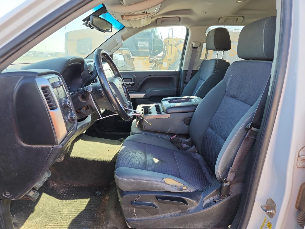 2015 Chevrolet Silverado K1500 Lt White vin: 1GCVKREC6FZ297903 Damage: Left Front Seat, Torn, 1 To 2 Inches