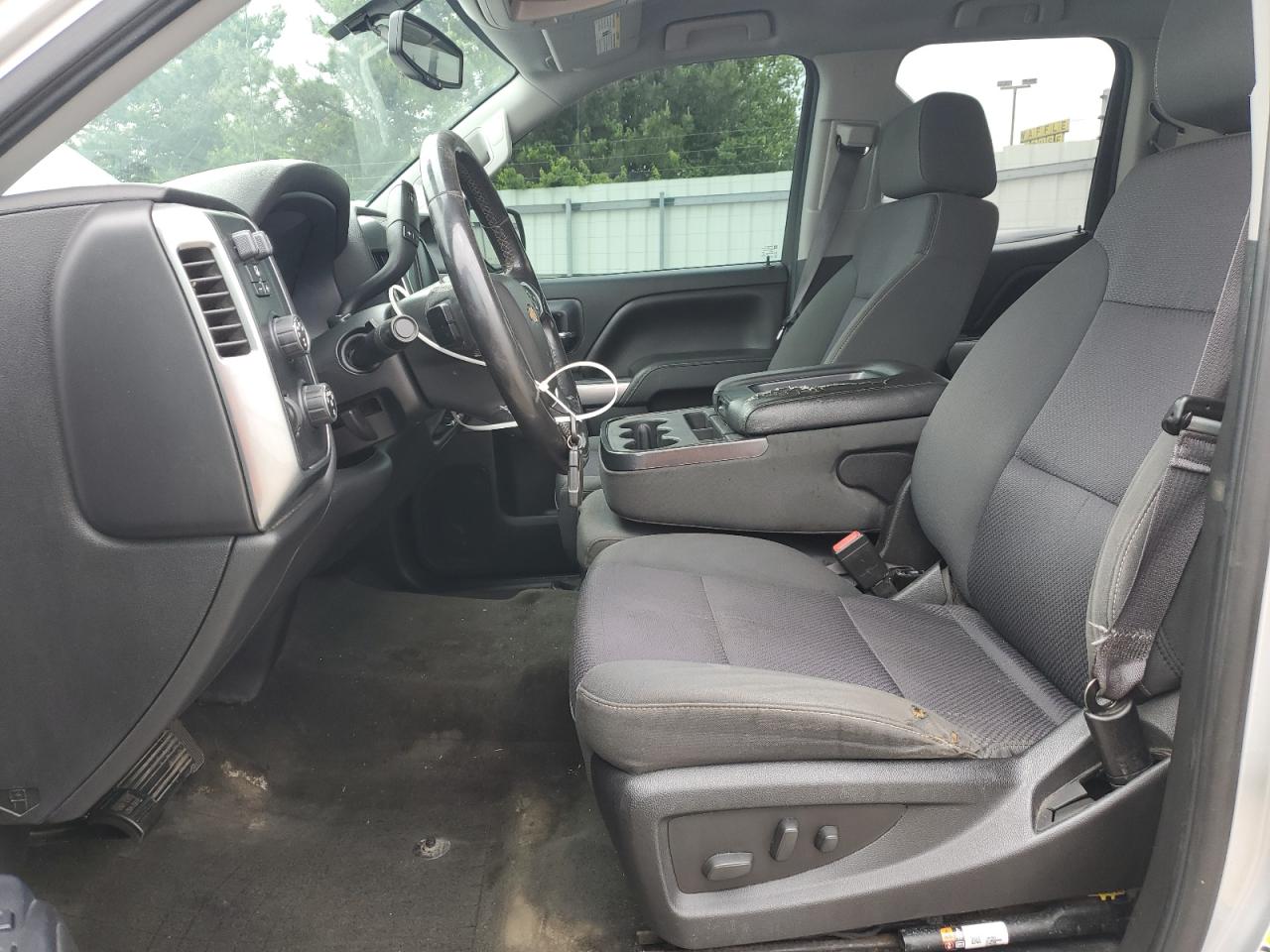 2015 Chevrolet Silverado K1500 Lt Silver vin: 1GCVKREC7FZ215032 Damage: Left Front Carpet, Worn, Replacement Required