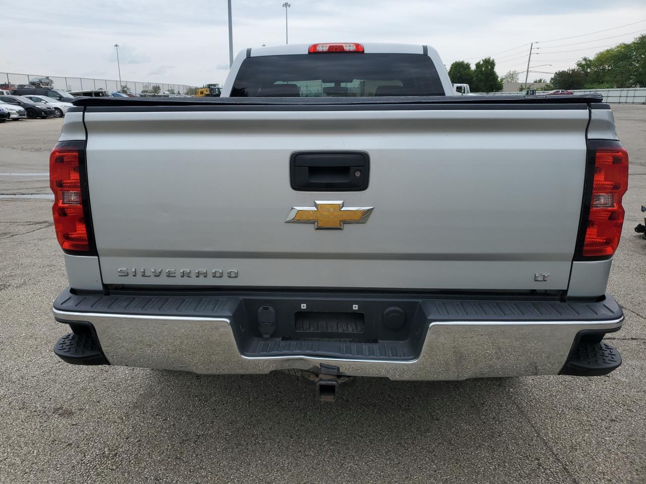 2015 Chevrolet Silverado K1500 Lt Silver vin: 1GCVKREC7FZ215032 Damage: Rear Metal Bumper Chrome, Dent(S) W/No Paint Dmg, 5 To 6 Inches