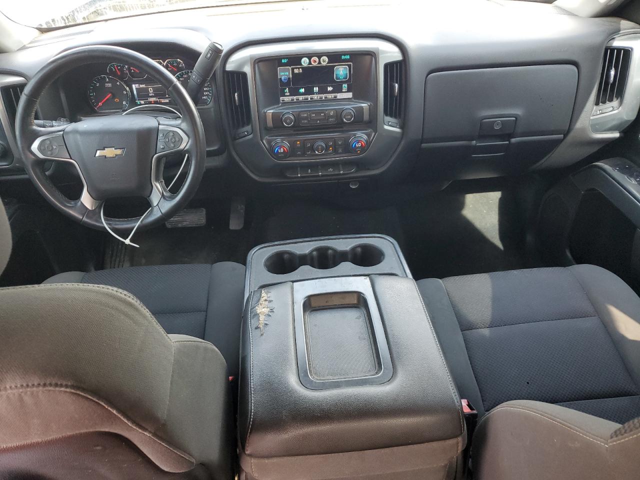 2015 Chevrolet Silverado K1500 Lt Blue vin: 1GCVKREH4FZ337990 Damage: Console Cover, Torn, 3 To 4 Inches