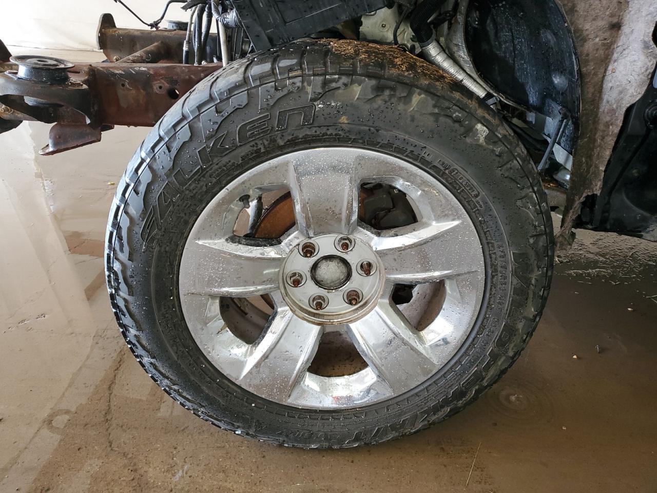 2014 Chevrolet Silverado K1500 Ltz Black vin: 1GCVKSEC3EZ270597 Damage: Left Front Center Cap, Missing, Replacement Required