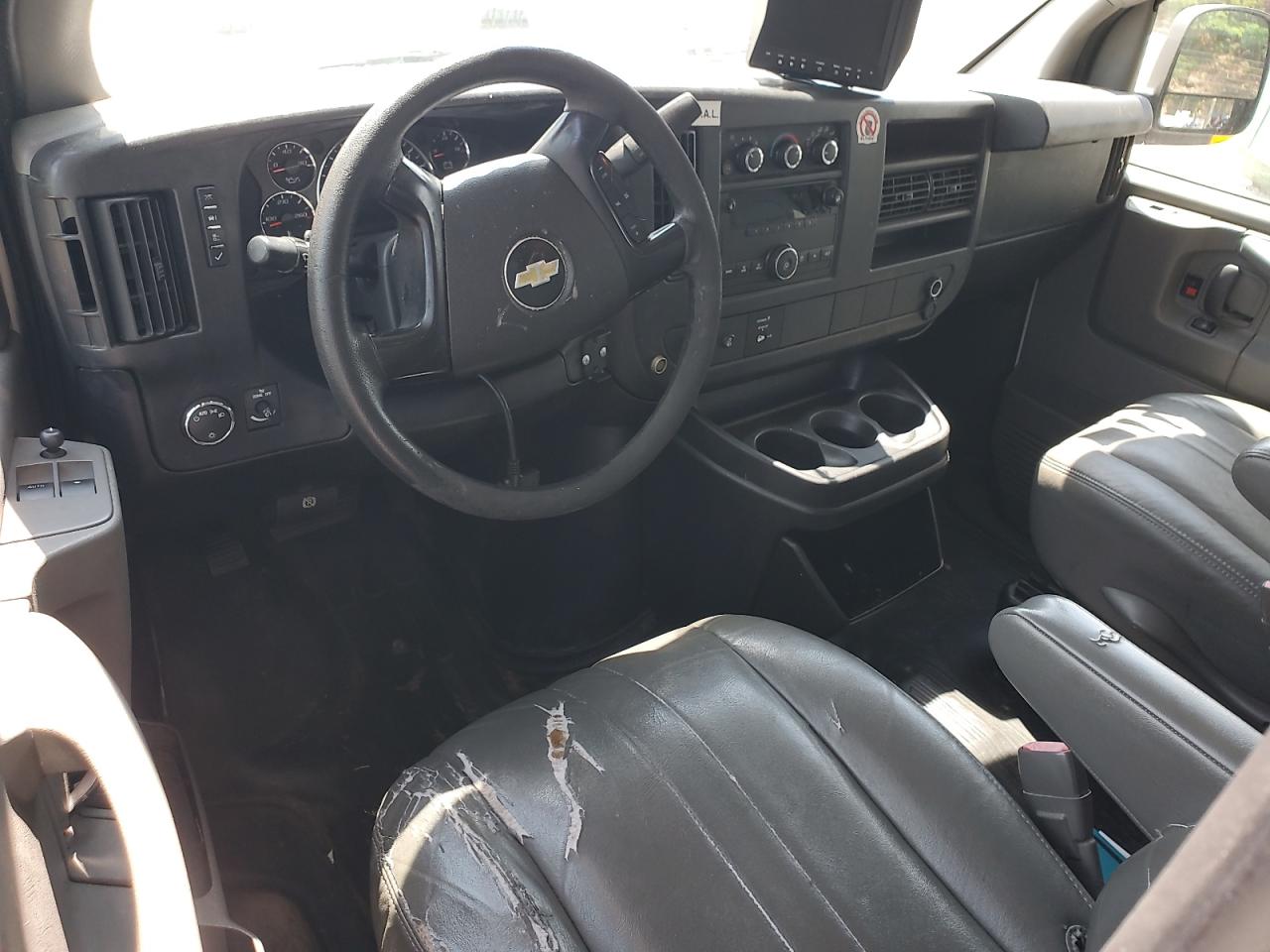 2012 Chevrolet Express G2500 White vin: 1GCWGGCA4C1156737 Damage: Left Front Seat, Torn, > 12 Inches