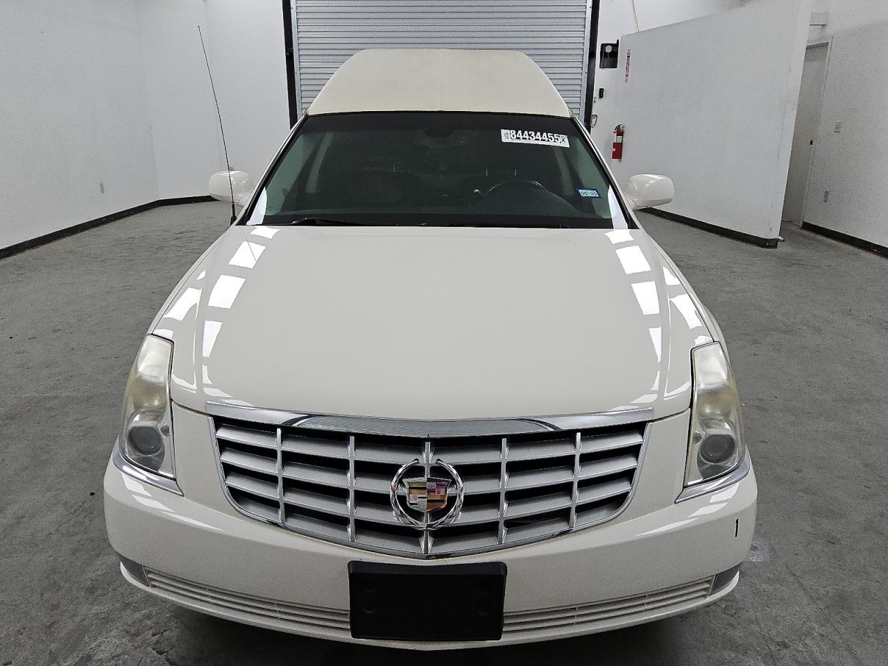 2011 Cadillac Professional Chassis White vin: 1GE7K9C65BU600027 Damage: Left Head Lamp, Faded, Repair Required