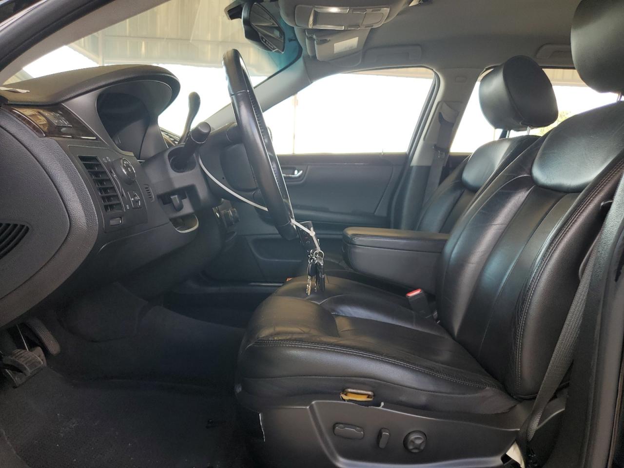 2011 Cadillac Professional Chassis Black vin: 1GE7K9C66BU600117 Damage: Left Front Seat Molding, Broken, Replacement Required
