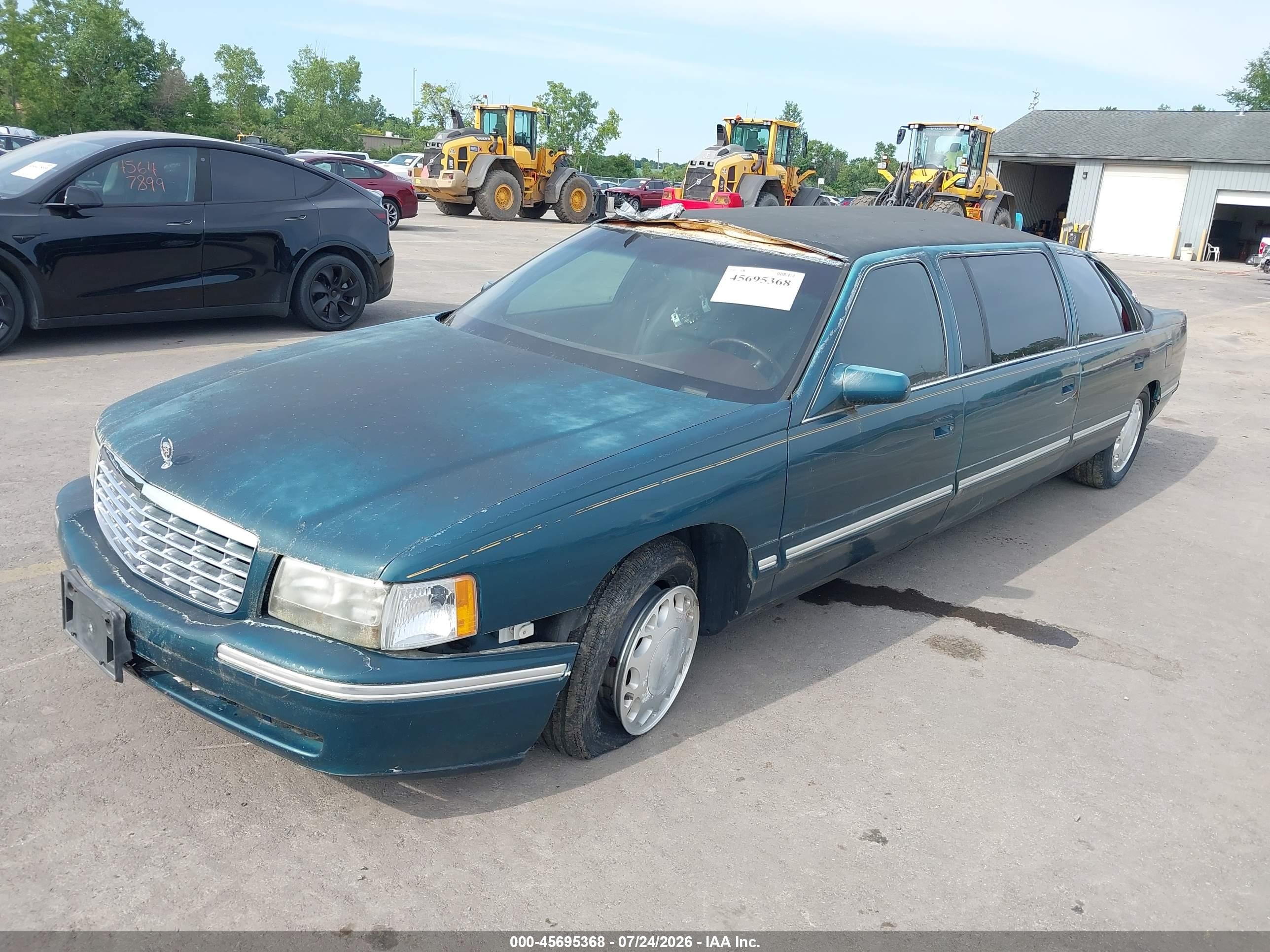 1997 Cadillac Deville Professional   Green vin: 1GEEH90Y4VU700443